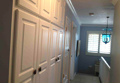 AFTER: Custom Cabinet Doors & Banister Painting